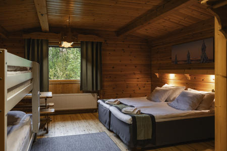 Doppelzimmer Standard im Blockhausstil mit Sitzecke