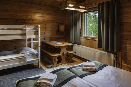 Doppelzimmer Standard im Blockhausstil mit Sitzecke